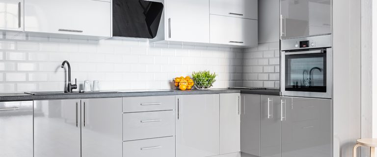 Gray,And,White,Kitchen,With,Modern,Brick,Wall